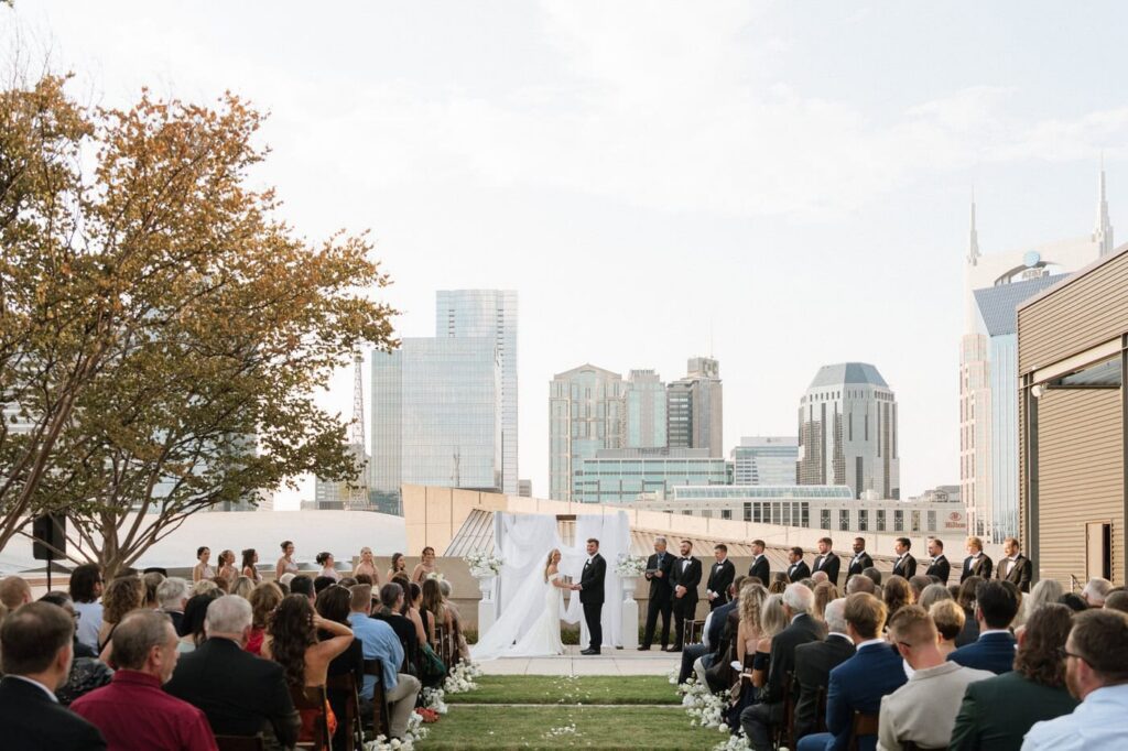 Wedding ceremony with the Nashville skyline at the Country Music Hall of Fame
