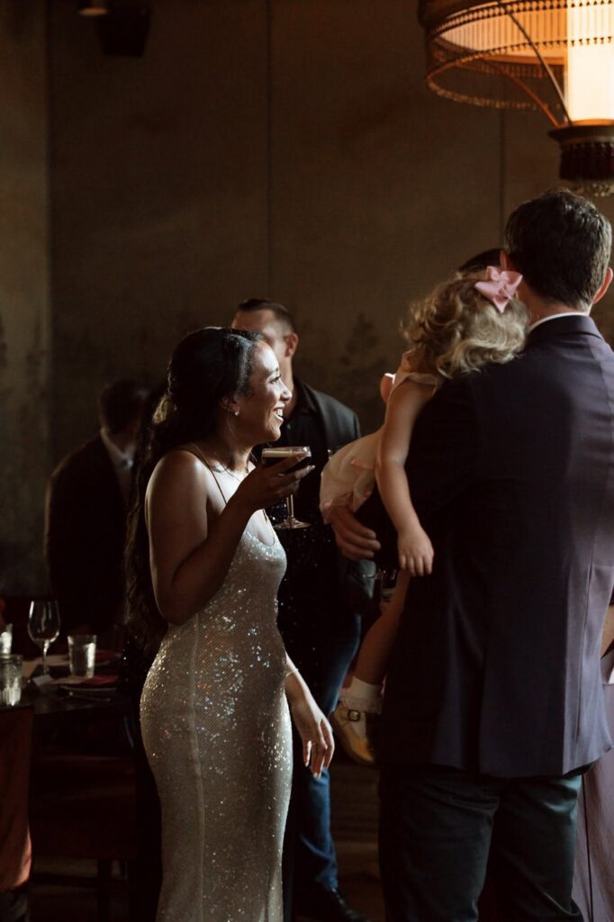 bride holding an espresso martini at the twelve thirty club wedding reception in nashville