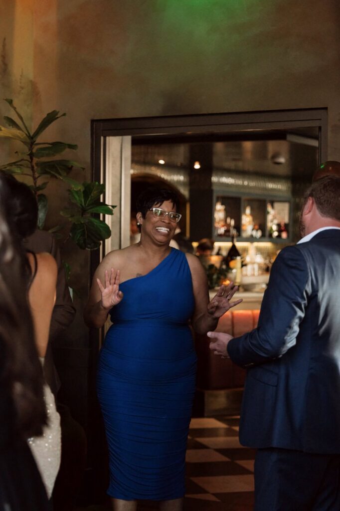 wedding guests laughing candidly