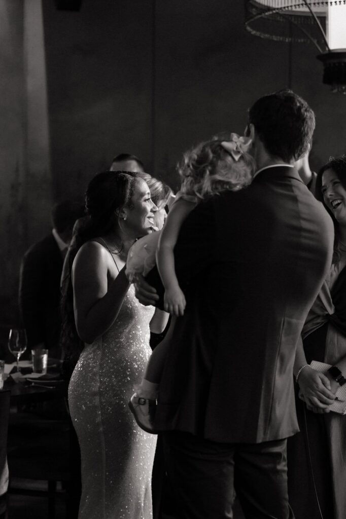 bride talking with wedding reception guests at the twelve thirty club